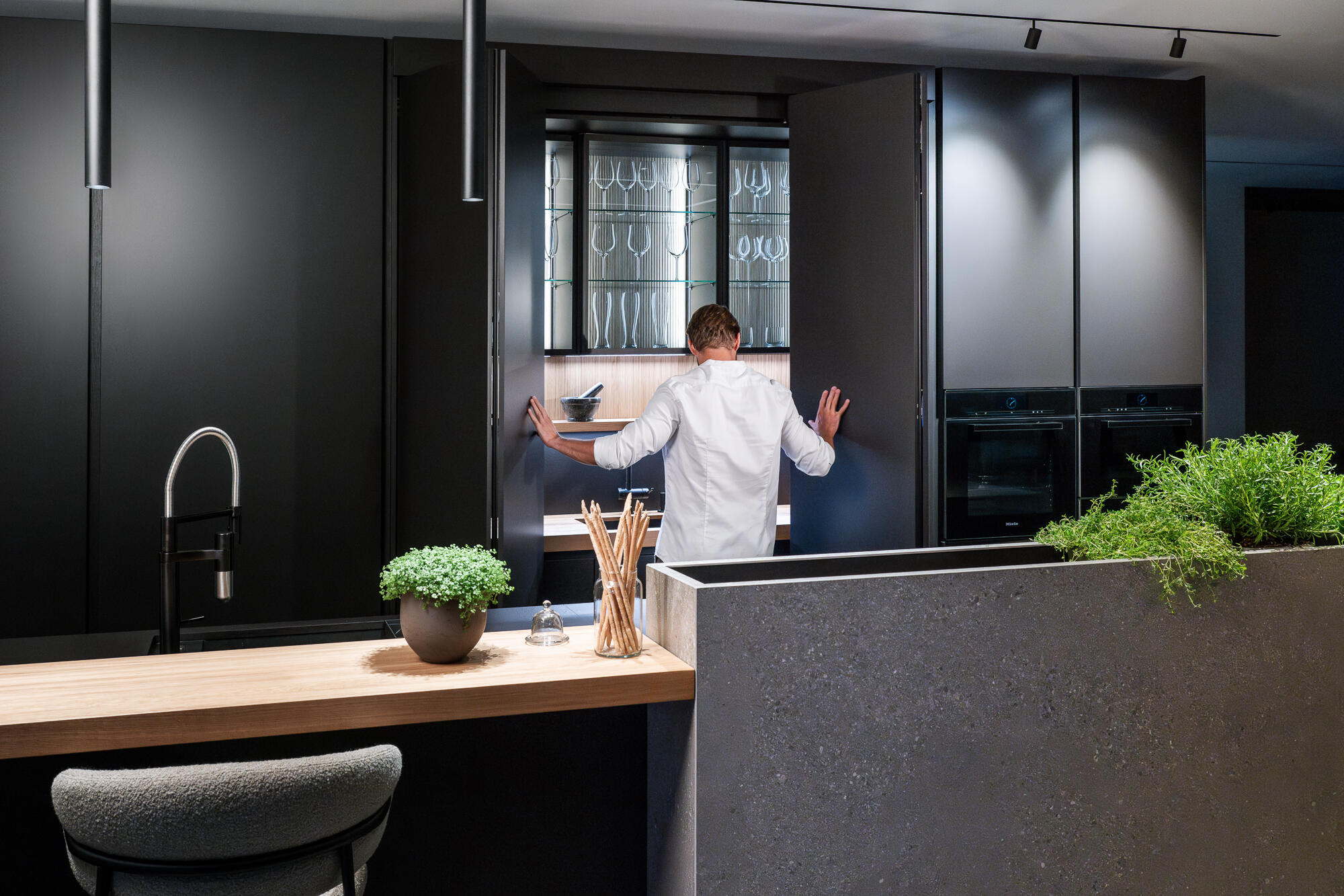 Kitchen in continuation with functional units of the entire interior